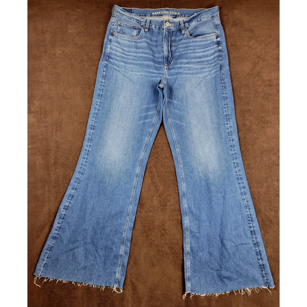 American Eagle Low-Rise Baggy Flare Jeans Medium Wash Raw Hem Size 12 Regular
